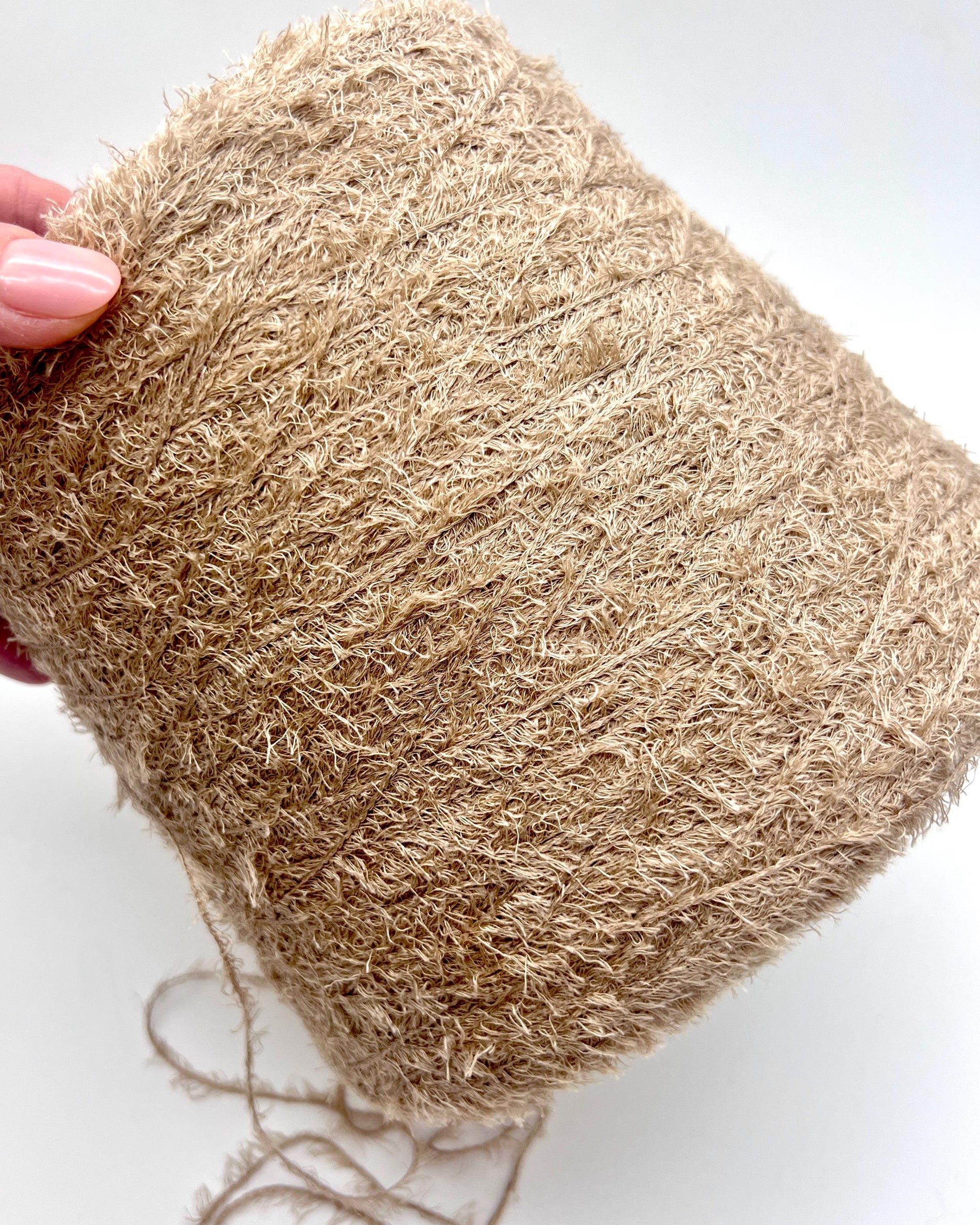 RiGo MANDORLO Italian grass yarn made from silk and merino wool, luxury textured fingering weight yarn for sweaters, shawls, and accessories.