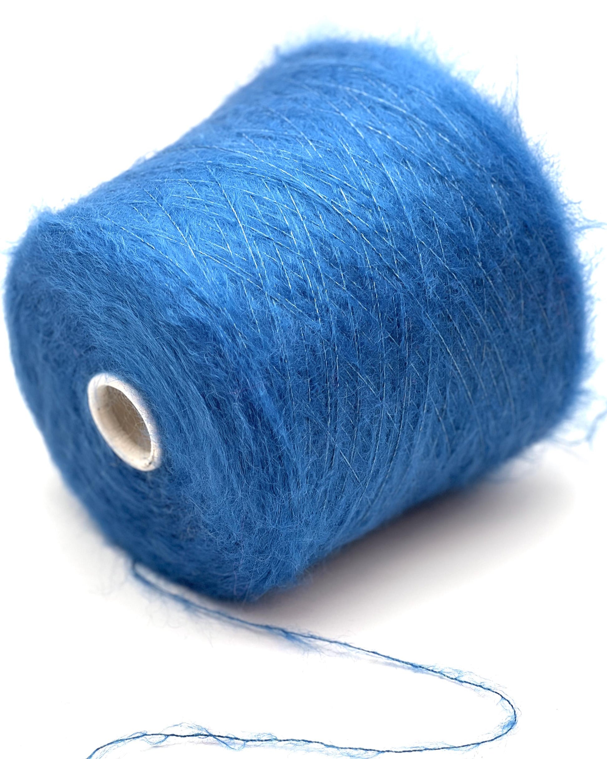 Blue yarn spool on a white background