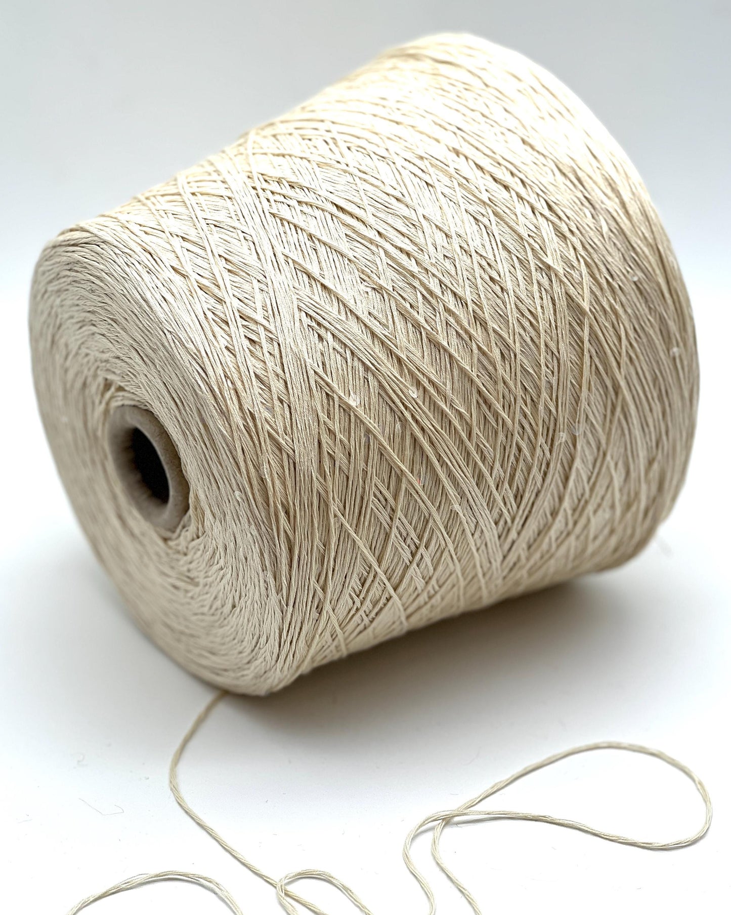 PAILLETTES Cotton yarn by Filati Naturali, Italy – 100% premium cotton with holographic 2mm sequins, ultra-soft and breathable with a sophisticated shimmer. Ideal for summer tops, evening shawls, and luxury knitwear. Premium Italian yarn available at iDOKNiT.com.