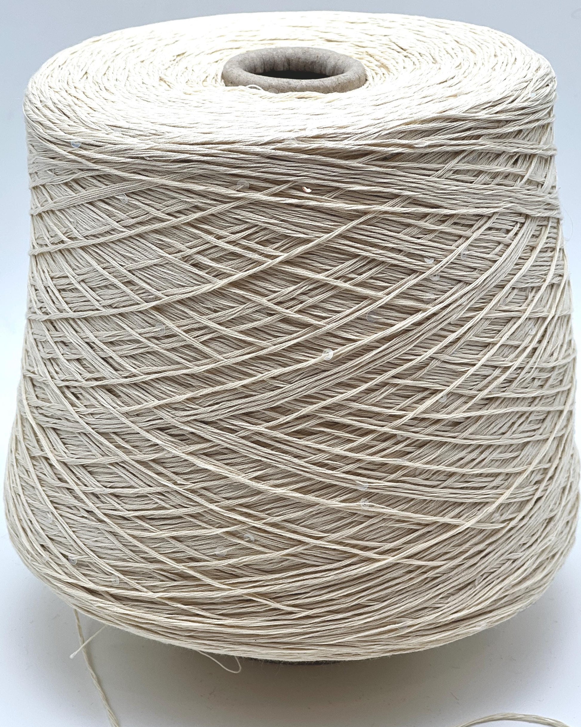 PAILLETTES Cotton yarn by Filati Naturali, Italy – 100% premium cotton with holographic 2mm sequins, ultra-soft and breathable with a sophisticated shimmer. Ideal for summer tops, evening shawls, and luxury knitwear. Premium Italian yarn available at iDOKNiT.com.