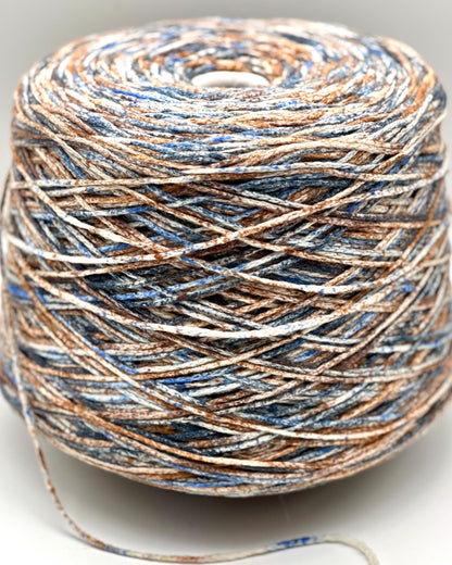 Ball of multicolored yarn on a light background