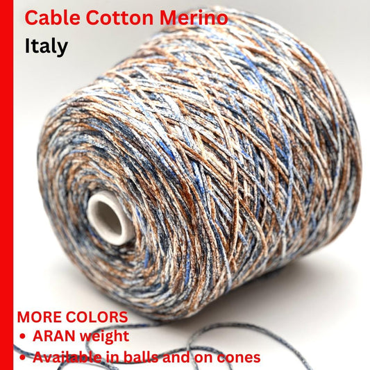 Spool of Cable Cotton Merino yarn with color swatch on a white background