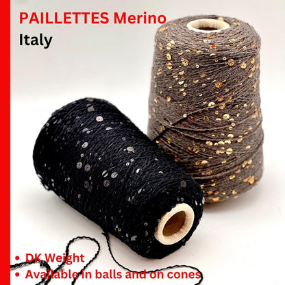 Two spools of yarn, one black and one brown with gold sequins, on a white background.