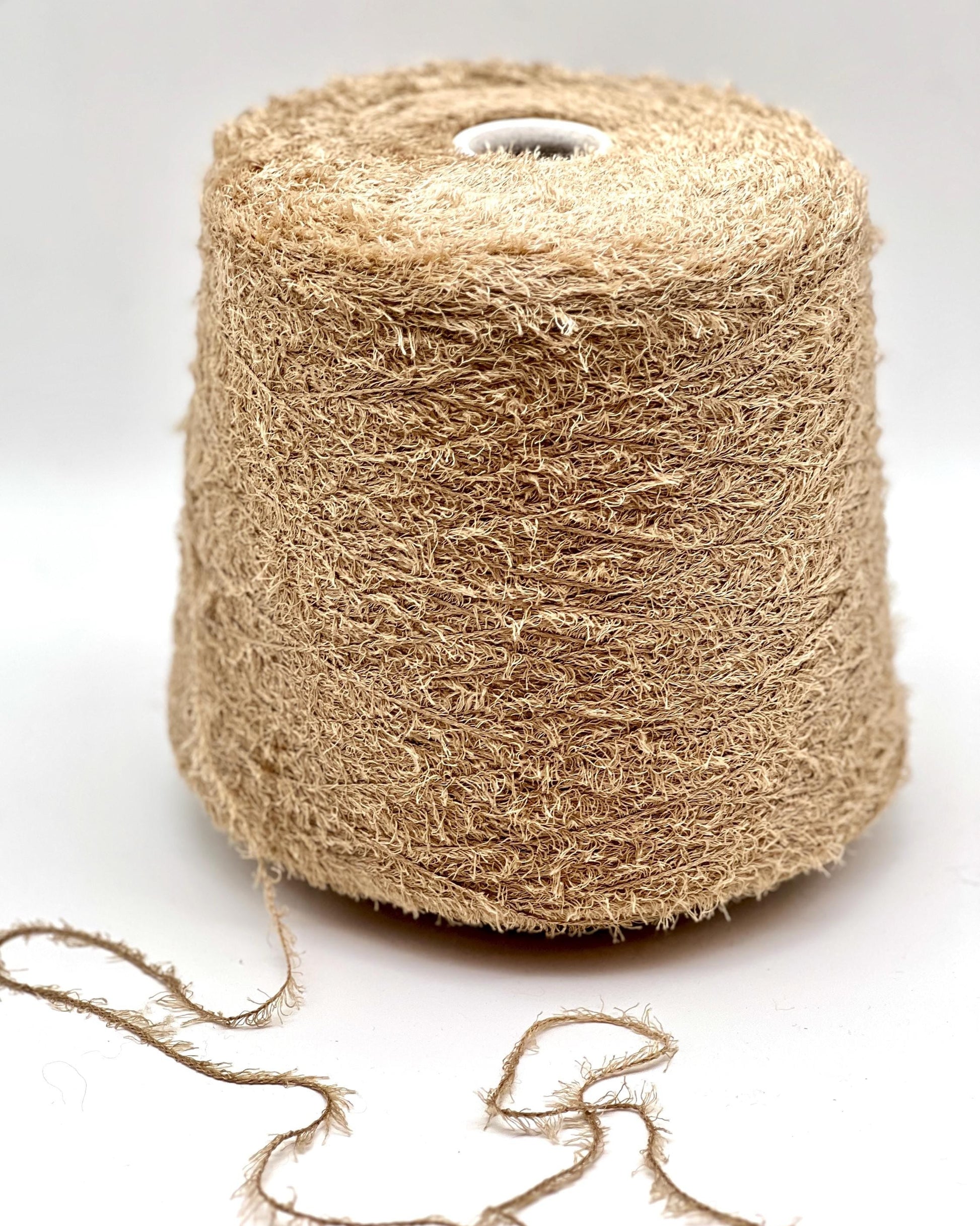 RiGo MANDORLO Italian grass yarn made from silk and merino wool, luxury textured fingering weight yarn for sweaters, shawls, and accessories.