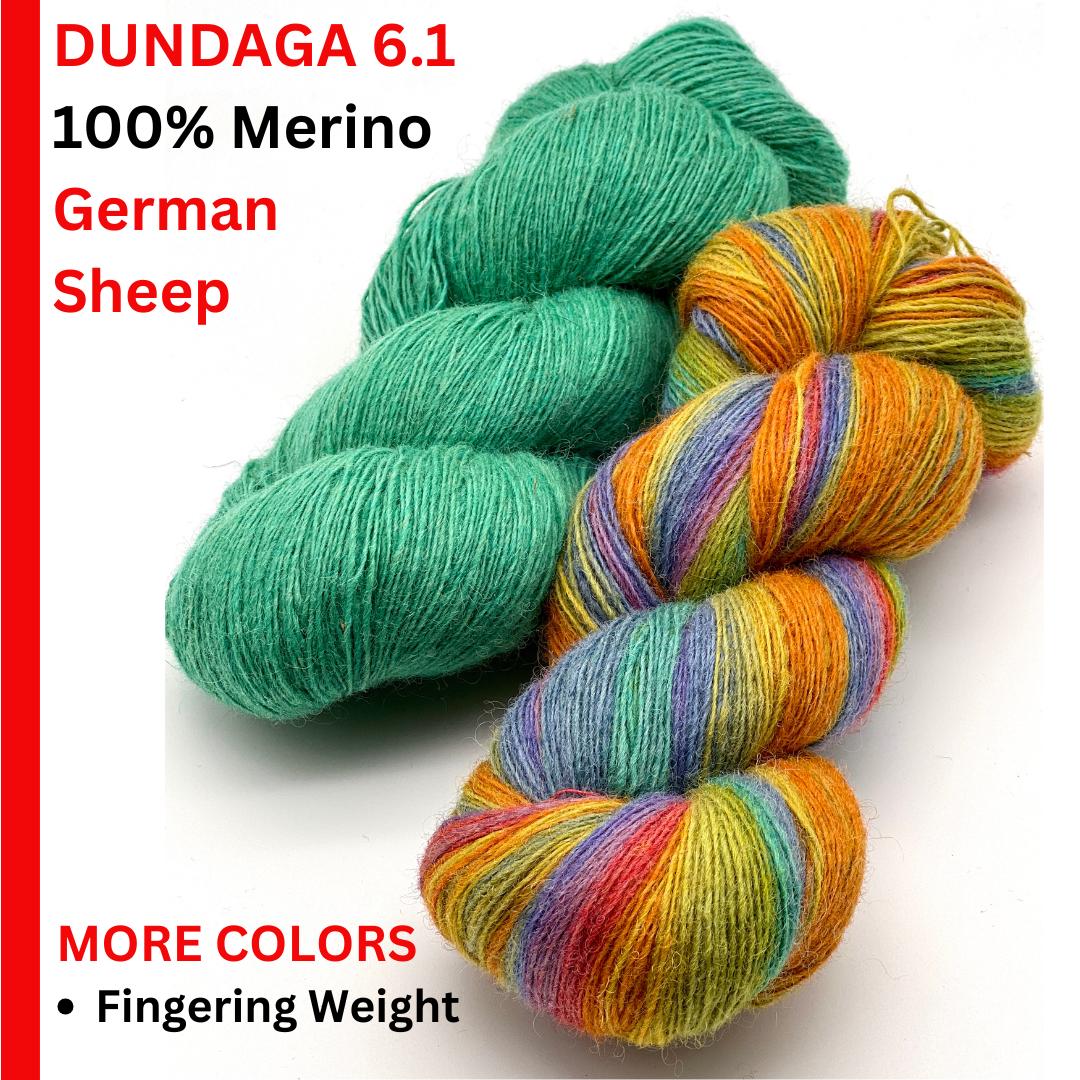 DUNDAGA 6/1 fingering weight yarn – 100% Merino wool from German sheep, high lanolin content for a soft rustic feel, shown in natural hand-dyed gradients. Ideal for cozy sweaters and heritage knitting with authentic German sheep wool. Premium European yarn available at iDOKNiT.com.