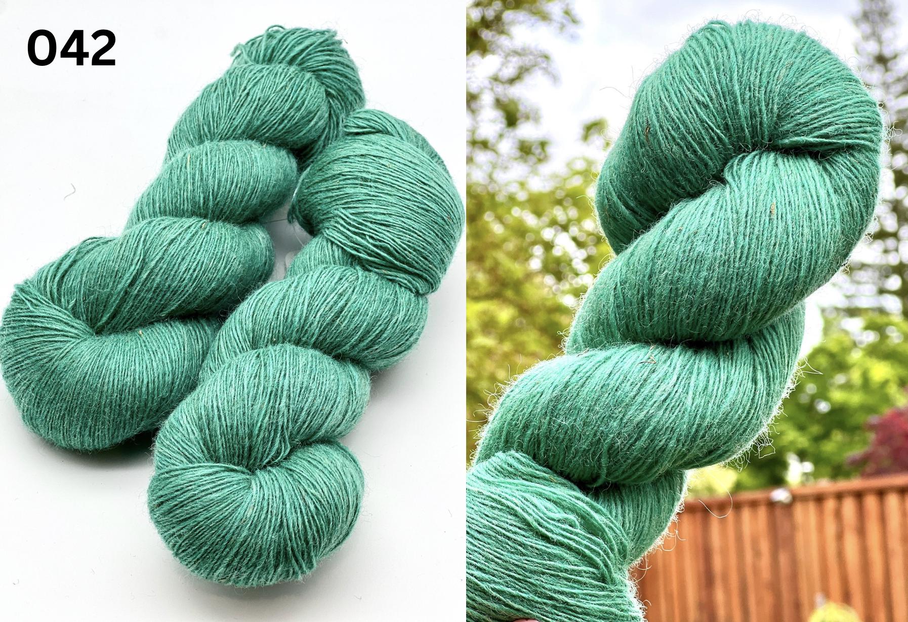 DUNDAGA 6/1 fingering weight yarn – 100% Merino wool from German sheep, high lanolin content for a soft rustic feel, shown in natural hand-dyed gradients. Ideal for cozy sweaters and heritage knitting with authentic German sheep wool. Premium European yarn available at iDOKNiT.com.