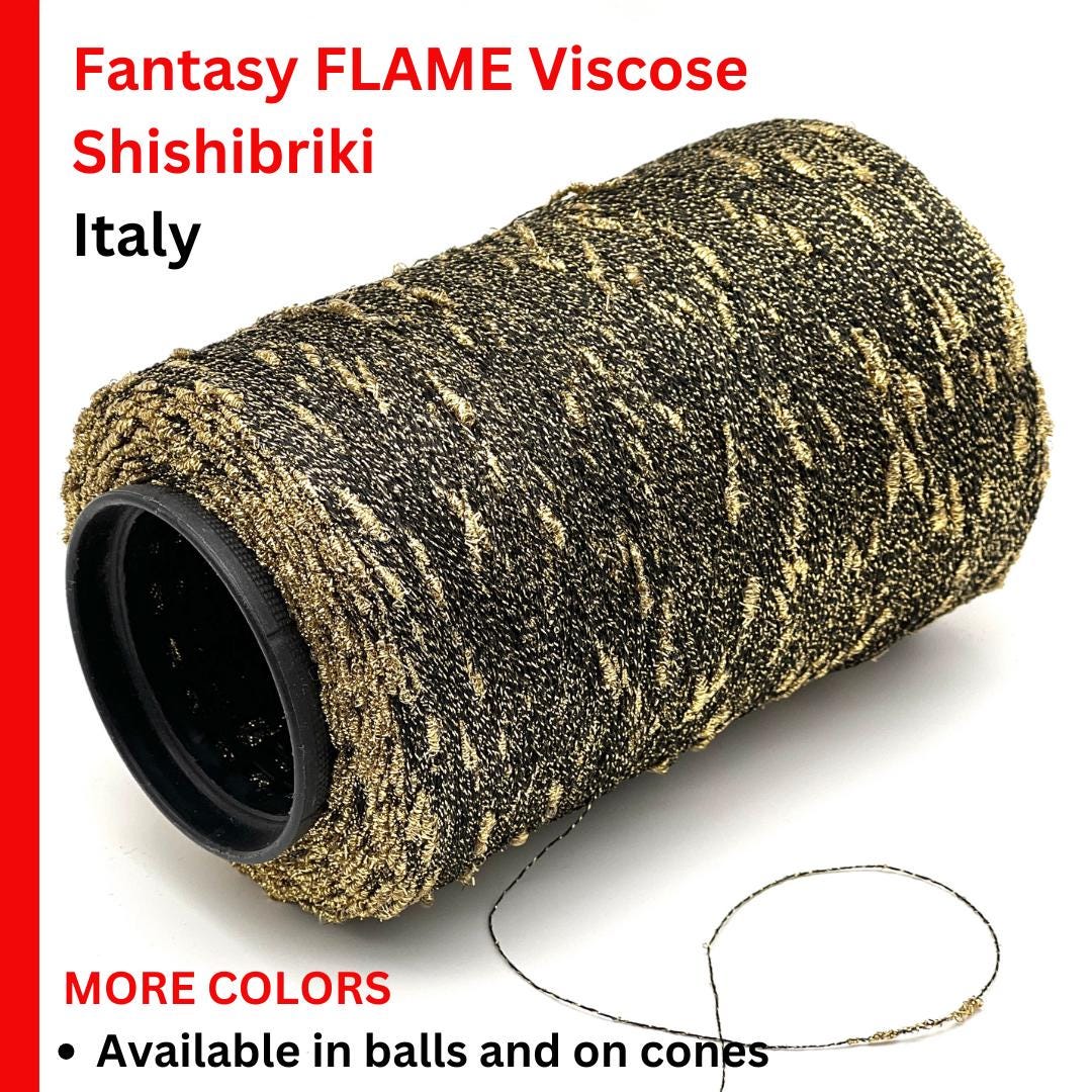 Textured cylindrical object with 'Fantasy FLAME Viscose Shishibriki Italy' text on a white background.