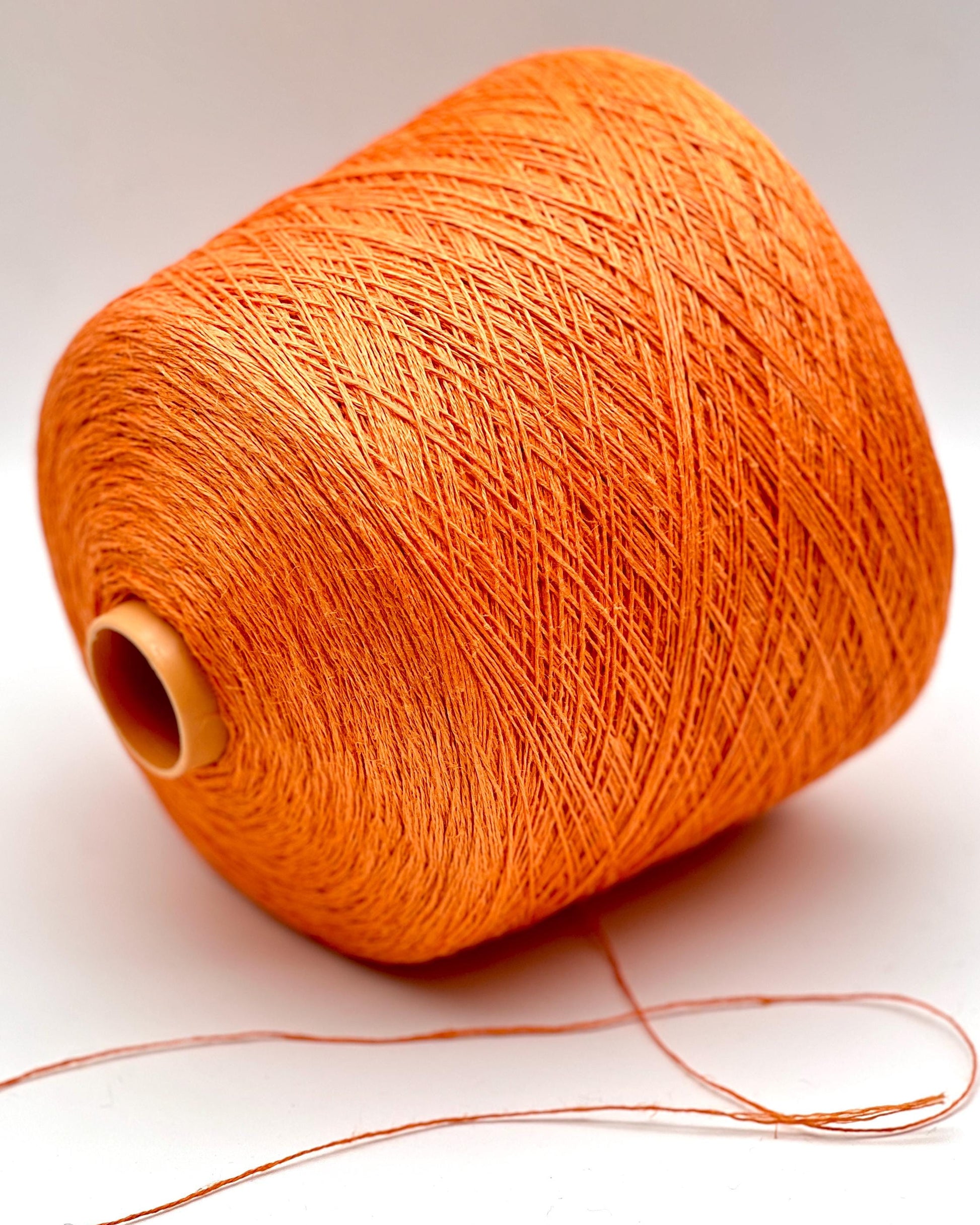 Premium iDOKNiT fingering weight yarn, FRESCOLINO by RiGo Italy. 100% pure linen fiber with an Nm 3/12 count, providing 400m per 100g. Authentic Italian-made plant fiber curated by iDOKNiT for breathable, long-lasting summer garments in vibrant shades like 1488 Orange and 1489 Beige.