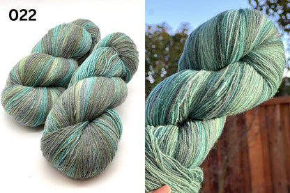 Exclusive iDOKNiT fingering weight heritage yarn, DUNDAGA 6.1 from Paces Vilnas Fabrika, Latvia. A traditional 6/1 single-ply blend of 70% Latvian wool and 30% Latvian merino, providing 460m per 100g. Curated by iDOKNiT in a spectrum of authentic blue and green Baltic shades (022, 023, 024, 054, 067, 069, 092) for rustic-refined knitwear with a soft, natural bloom.