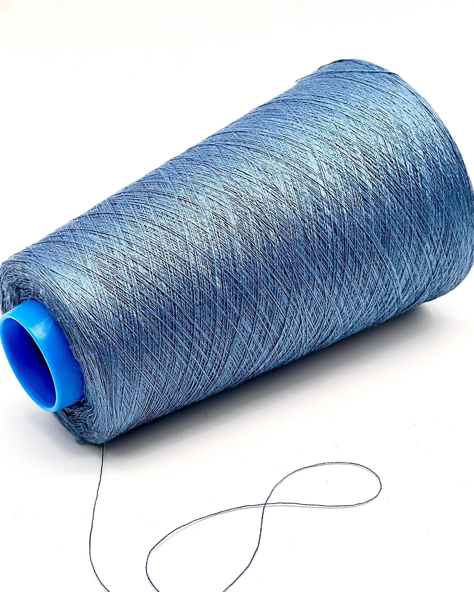 Botto Giuseppe Shine 100% pure Mulberry silk extra-fine lace weight yarn from iDOKNiT. Premium sustainable Italian-spun fiber with high natural luster for luxury knitting and weaving, 3000m per 100g cone.