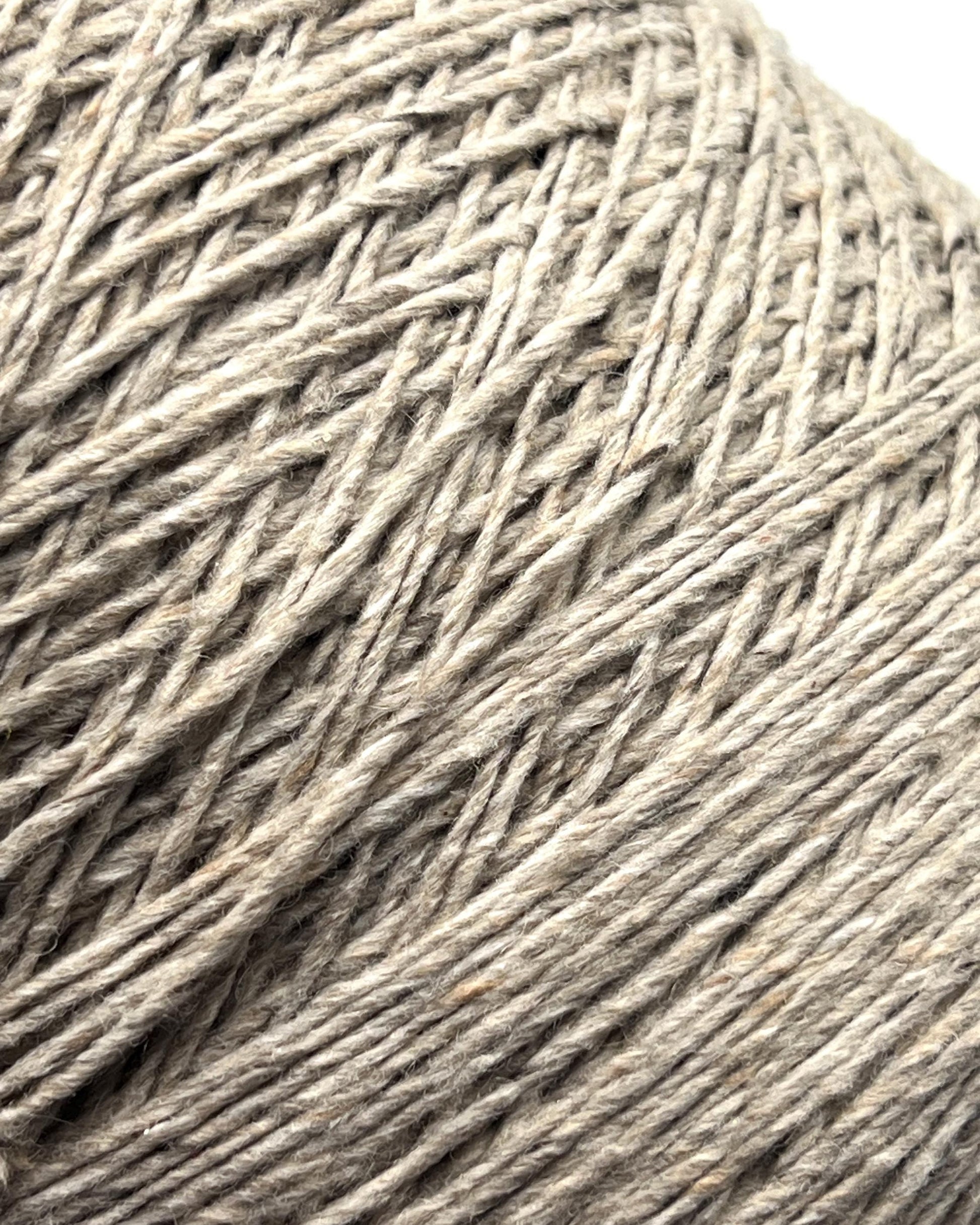 Exclusive iDOKNiT DK weight cashmere yarn, Cashmere Donegal by Cariaggi Italy. 100% pure cashmere featuring a sophisticated Donegal tweed texture, Nm 2.000, providing 200m per 100g. Authentic Italian-made luxury fiber in 1540 Stone Beige Melange, curated by iDOKNiT for exceptionally soft, high-end sweaters and winter accessories.