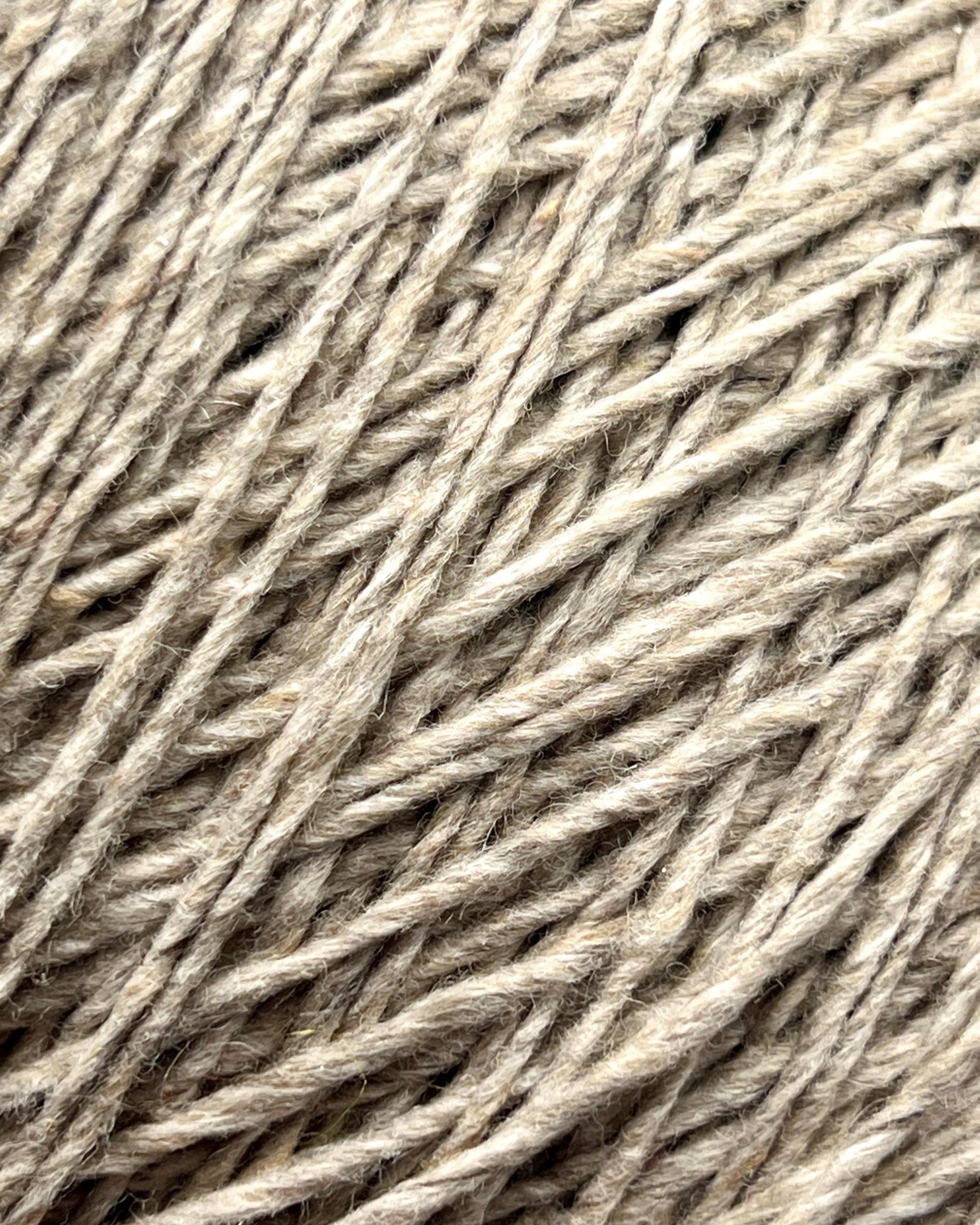 Exclusive iDOKNiT DK weight cashmere yarn, Cashmere Donegal by Cariaggi Italy. 100% pure cashmere featuring a sophisticated Donegal tweed texture, Nm 2.000, providing 200m per 100g. Authentic Italian-made luxury fiber in 1540 Stone Beige Melange, curated by iDOKNiT for exceptionally soft, high-end sweaters and winter accessories.