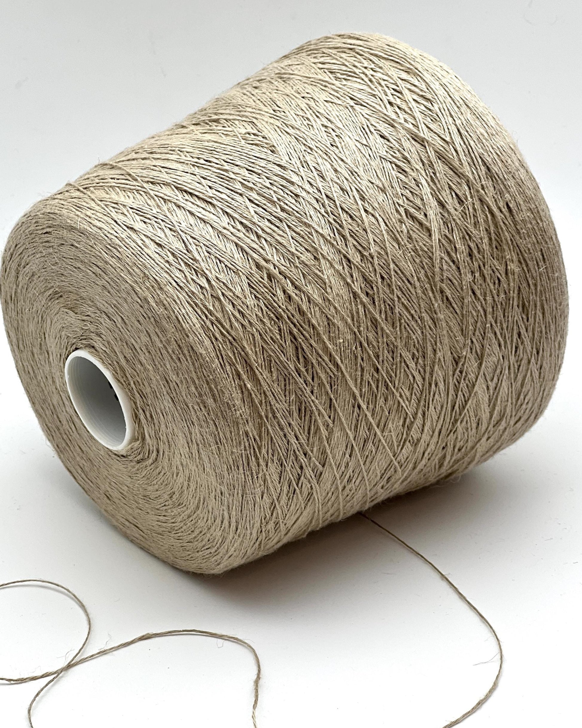 Premium iDOKNiT fingering weight yarn, FRESCOLINO by RiGo Italy. 100% pure linen fiber with an Nm 3/12 count, providing 400m per 100g. Authentic Italian-made plant fiber curated by iDOKNiT for breathable, long-lasting summer garments in vibrant shades like 1488 Orange and 1489 Beige.