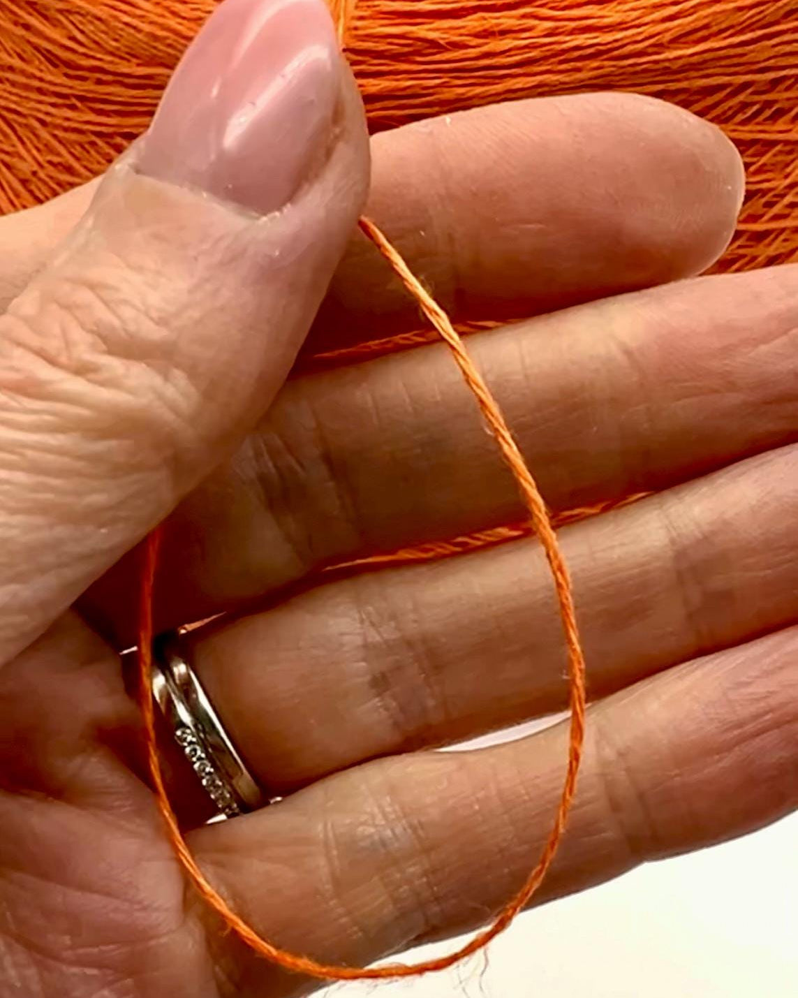Premium iDOKNiT fingering weight yarn, FRESCOLINO by RiGo Italy. 100% pure linen fiber with an Nm 3/12 count, providing 400m per 100g. Authentic Italian-made plant fiber curated by iDOKNiT for breathable, long-lasting summer garments in vibrant shades like 1488 Orange and 1489 Beige.