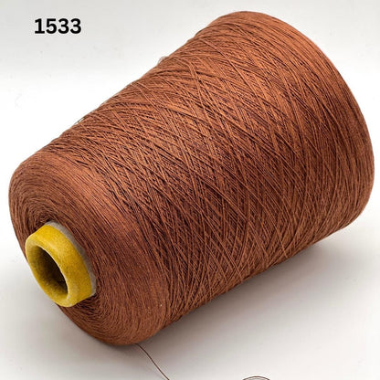 Emilcotoni Silk & Cotton lace yarn from Italy. Shown on professional cones in shades like Ochre, Navy Blue, and Brown. High-quality designer yarn for retail at iDOKNiT.com.