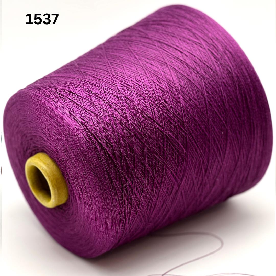 Emilcotoni Silk & Cotton lace yarn from Italy. Shown on professional cones in shades like Ochre, Navy Blue, and Brown. High-quality designer yarn for retail at iDOKNiT.com.