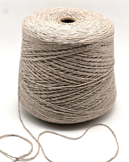 Exclusive iDOKNiT DK weight cashmere yarn, Cashmere Donegal by Cariaggi Italy. 100% pure cashmere featuring a sophisticated Donegal tweed texture, Nm 2.000, providing 200m per 100g. Authentic Italian-made luxury fiber in 1540 Stone Beige Melange, curated by iDOKNiT for exceptionally soft, high-end sweaters and winter accessories.