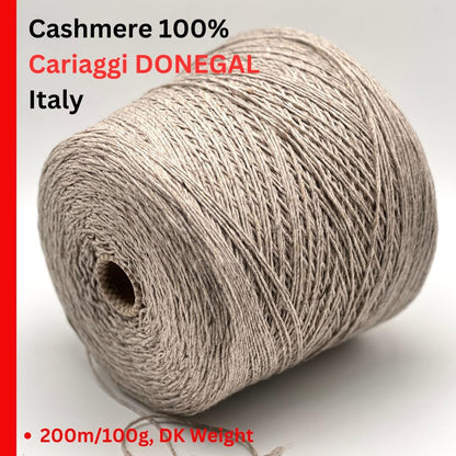 Exclusive iDOKNiT DK weight cashmere yarn, Cashmere Donegal by Cariaggi Italy. 100% pure cashmere featuring a sophisticated Donegal tweed texture, Nm 2.000, providing 200m per 100g. Authentic Italian-made luxury fiber in 1540 Stone Beige Melange, curated by iDOKNiT for exceptionally soft, high-end sweaters and winter accessories.