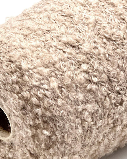 Close-up of a textured beige roll of paper towel