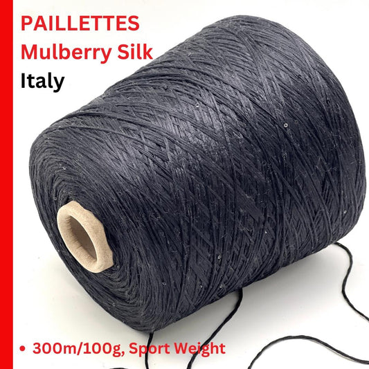 Spool of black mulberry silk yarn with text on a white background