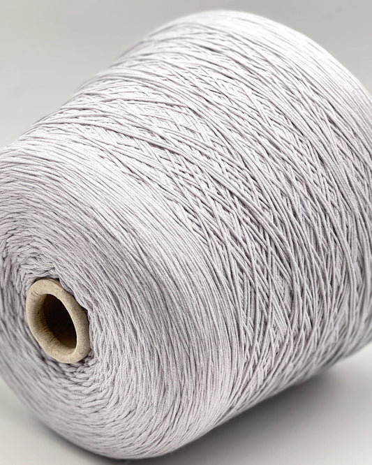 Spool of gray yarn on a light gray background