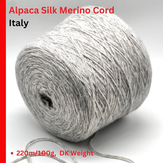 Roll of Alpaca Silk Merino Cord from Italy on a white background