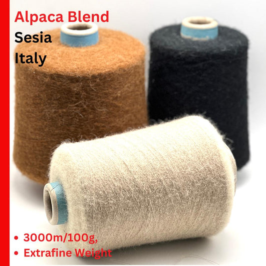 Three spools of alpaca blend yarn with text indicating brand, origin, and specifications.