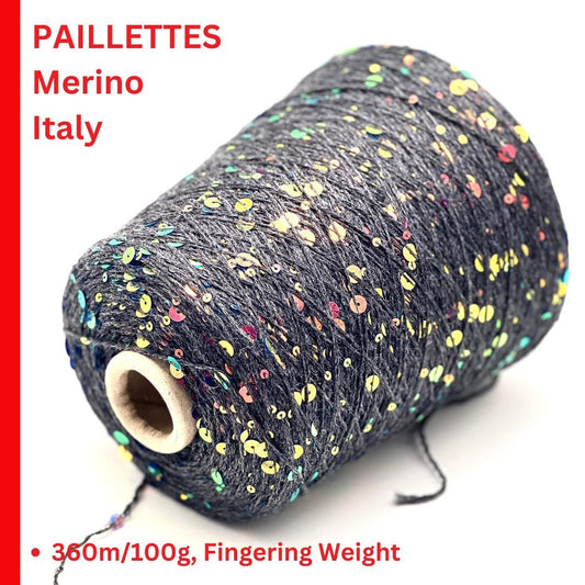 Spool of yarn with colorful paillettes on a white background, labeled 'Paillettes Merino Italy'.