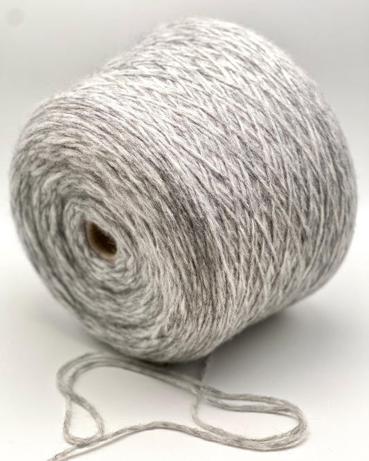 Ball of gray yarn on a white background
