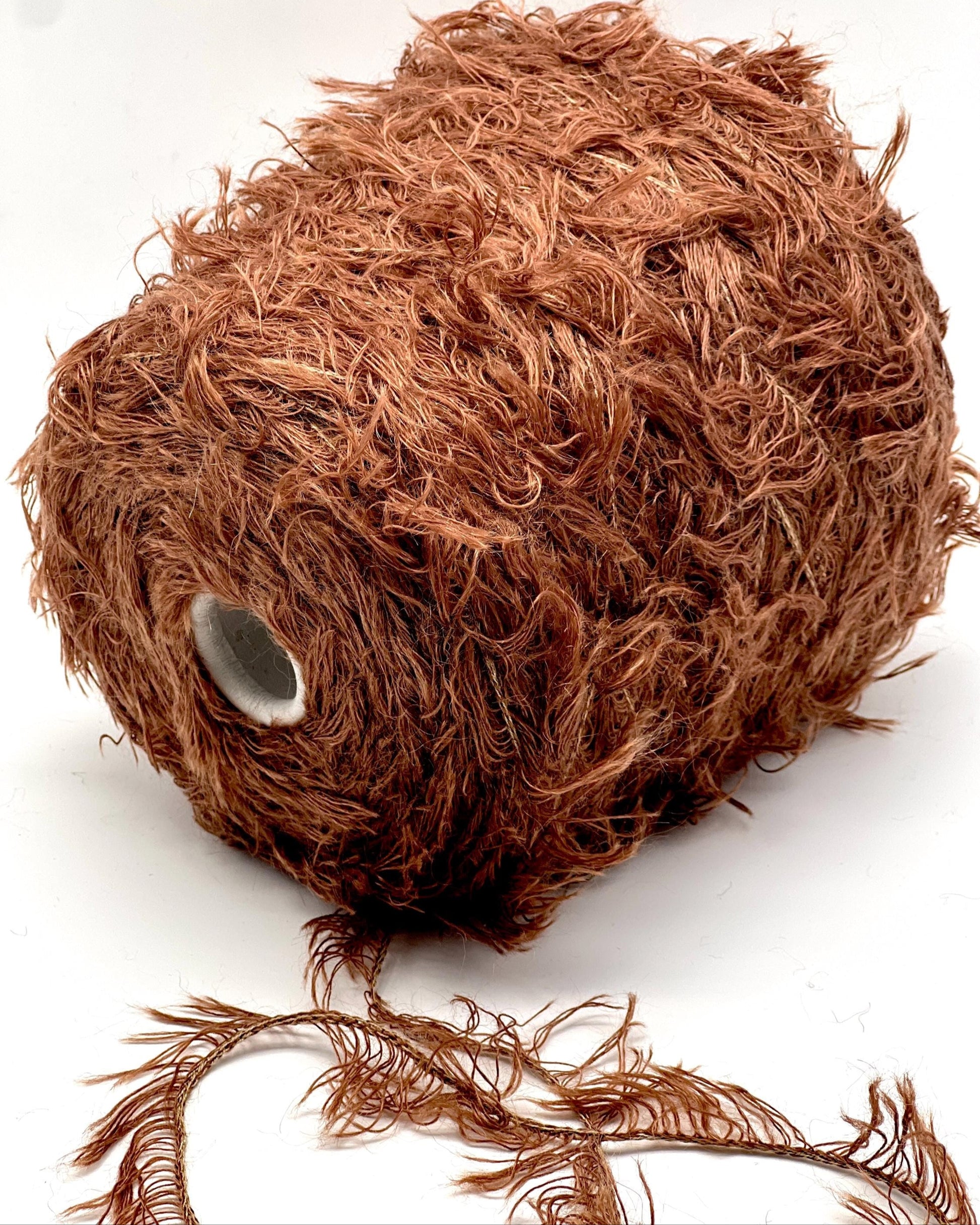 Coconut with a piece cut off on a white background