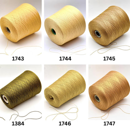 Six spools of yellow thread with numbers labeled on a white background