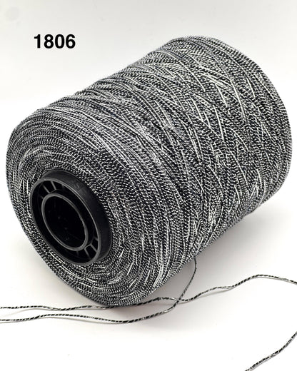 Spool of gray thread on a white background with '1806' text.