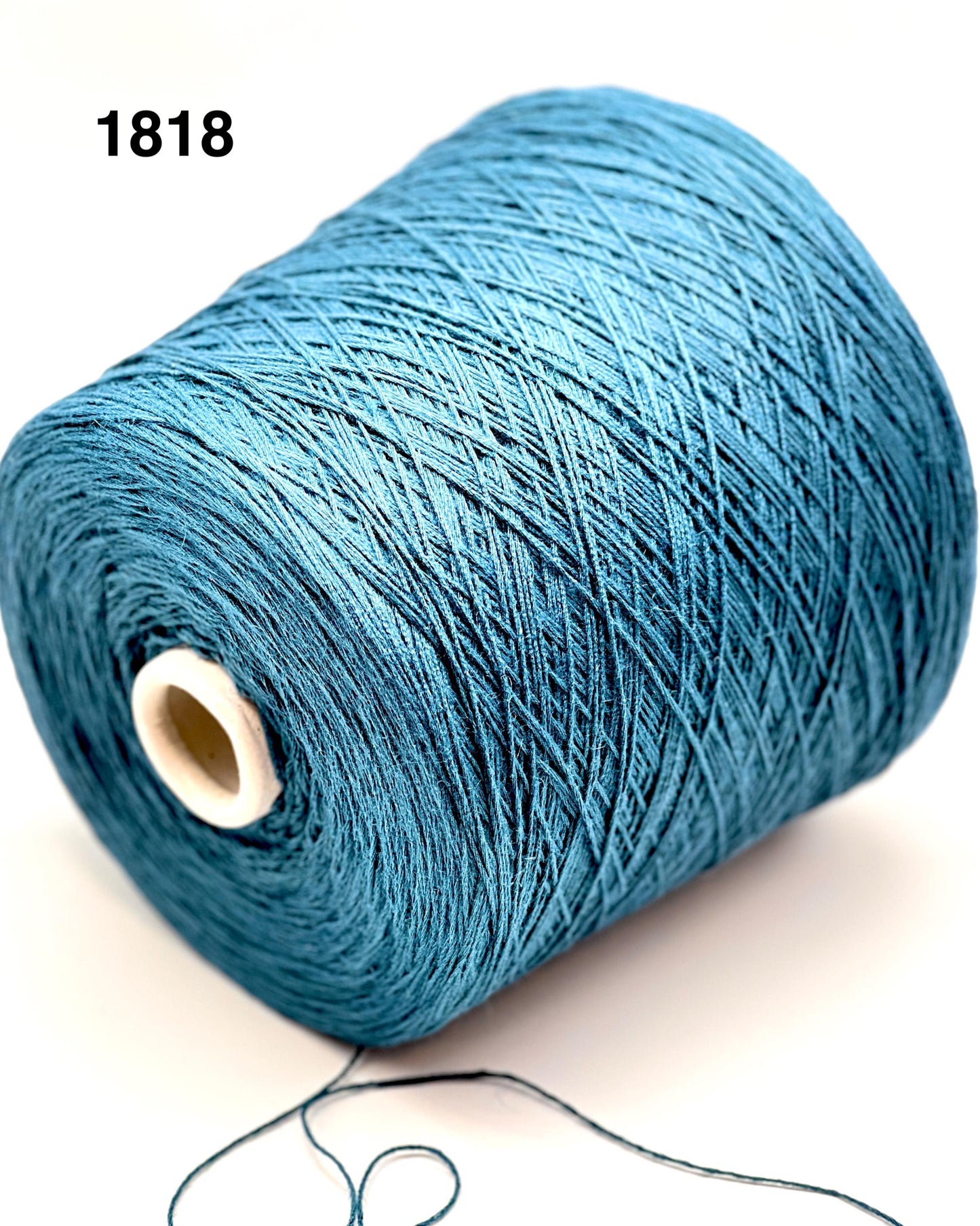 Blue spool of thread on a white background with '1818' text.