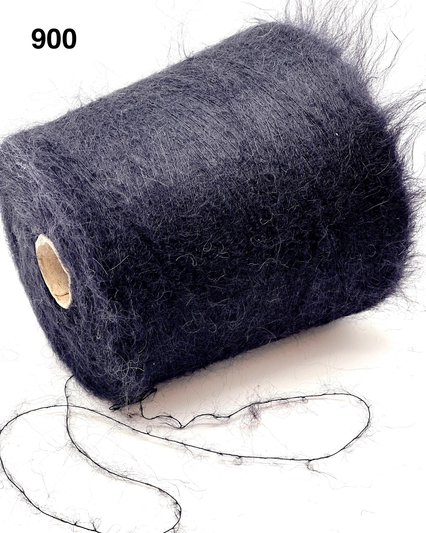 Spool of dark blue yarn on a white background