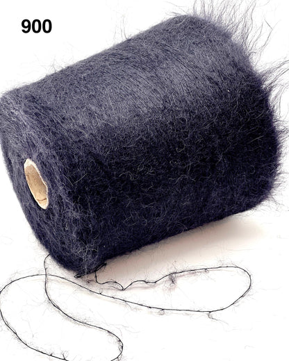 Spool of dark blue yarn on a white background