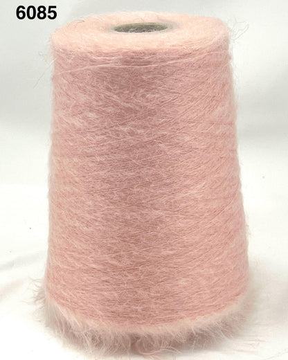 Pink yarn cone on a white background
