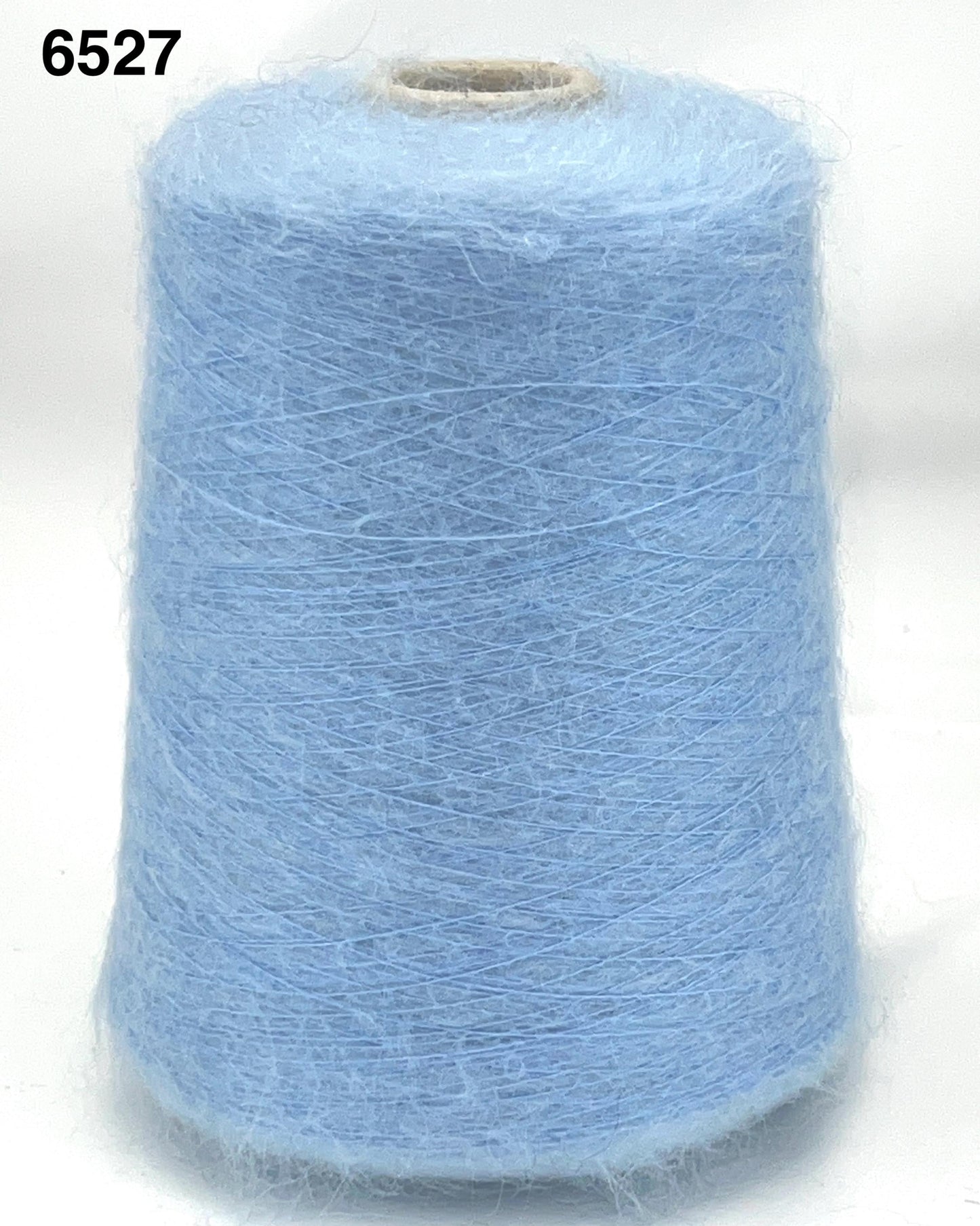 Light blue spool of yarn on a white background