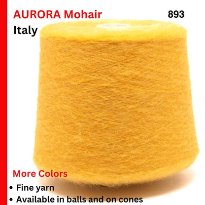 Yellow yarn cone with text about Aurora Mohair from Italy on a white background
