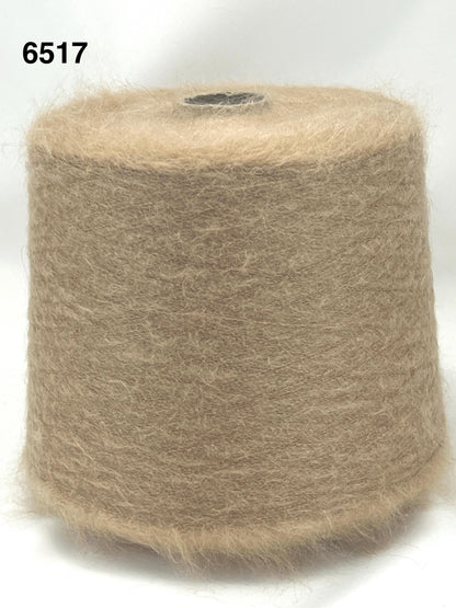 Brown yarn roll on a white background