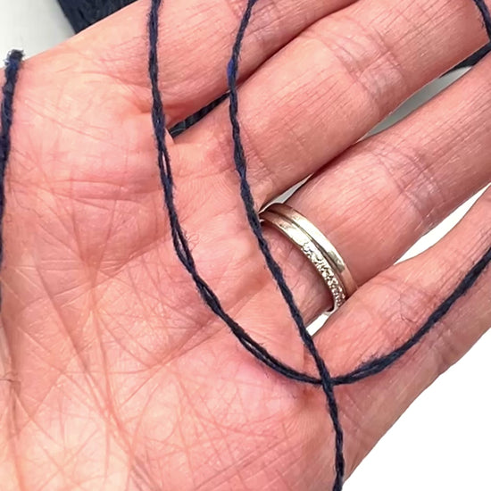 Elegant iDOKNiT SESIA SCOTLAND 100% Extrafine Merino Tweed lace yarn in Nm 2/14, showcasing a sophisticated rustic speckled texture and premium Italian wool quality.