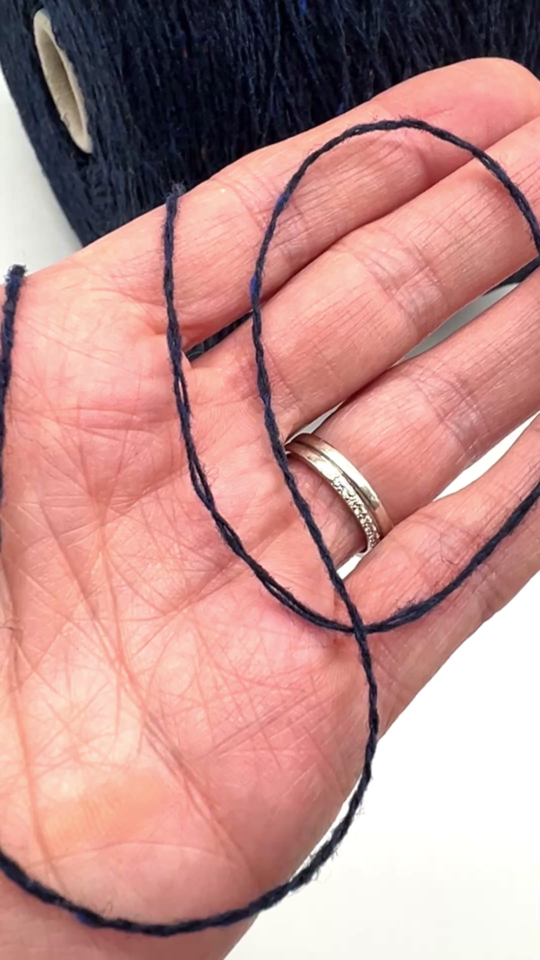 Elegant iDOKNiT SESIA SCOTLAND 100% Extrafine Merino Tweed lace yarn in Nm 2/14, showcasing a sophisticated rustic speckled texture and premium Italian wool quality.