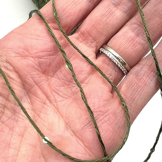 Professional grade RiGo STELLATO sport weight yarn from iDOKNiT, featuring a sophisticated 60% Italian cotton base with 2mm integrated paillettes. This authentic Italian-made yarn is curated by iDOKNiT to provide a refined shimmer and luxury finish for elegant, high-performance knitting projects.