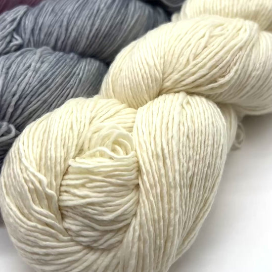 Premium iDOKNiT fingering weight yarn, MECHITA by Malabrigo Peru. 100% superwash merino wool, single-ply construction for elegant drape, 384m/100g. Hand-dyed authentic Peruvian yarn curated by iDOKNiT for soft, vibrant, and professional knitting projects.