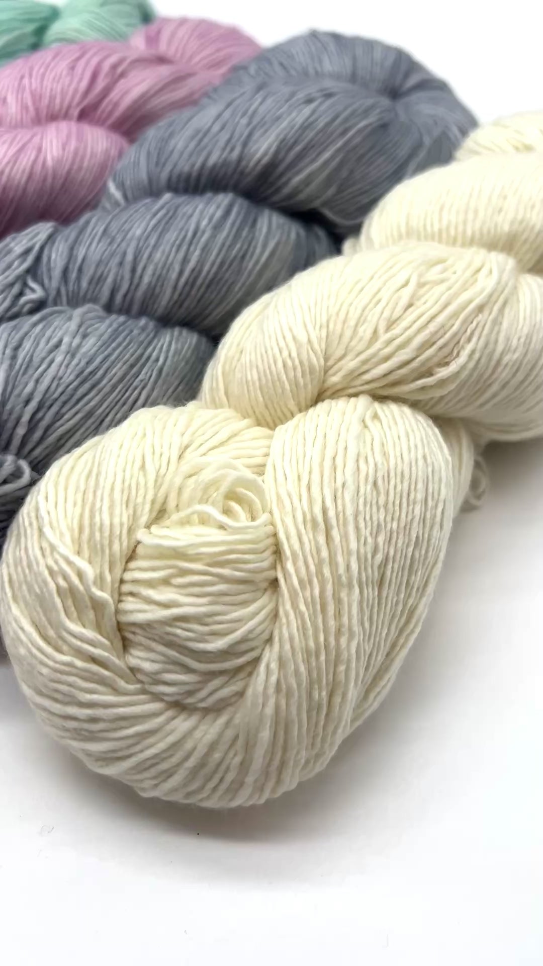 Premium iDOKNiT fingering weight yarn, MECHITA by Malabrigo Peru. 100% superwash merino wool, single-ply construction for elegant drape, 384m/100g. Hand-dyed authentic Peruvian yarn curated by iDOKNiT for soft, vibrant, and professional knitting projects.