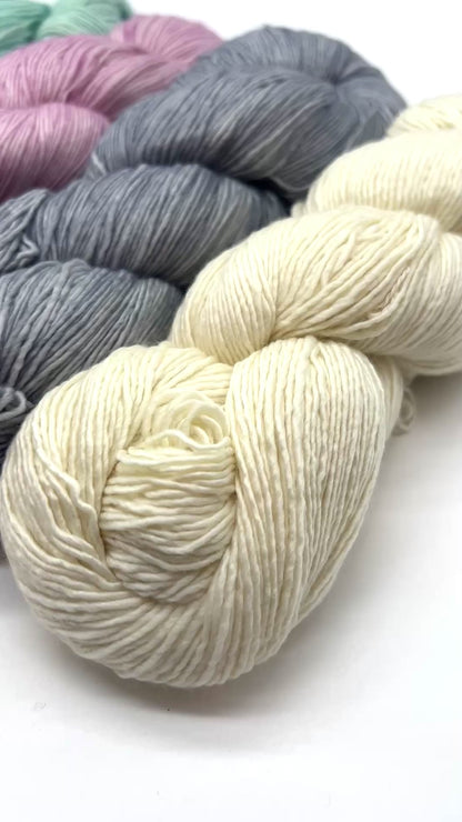 Premium iDOKNiT fingering weight yarn, MECHITA by Malabrigo Peru. 100% superwash merino wool, single-ply construction for elegant drape, 384m/100g. Hand-dyed authentic Peruvian yarn curated by iDOKNiT for soft, vibrant, and professional knitting projects.