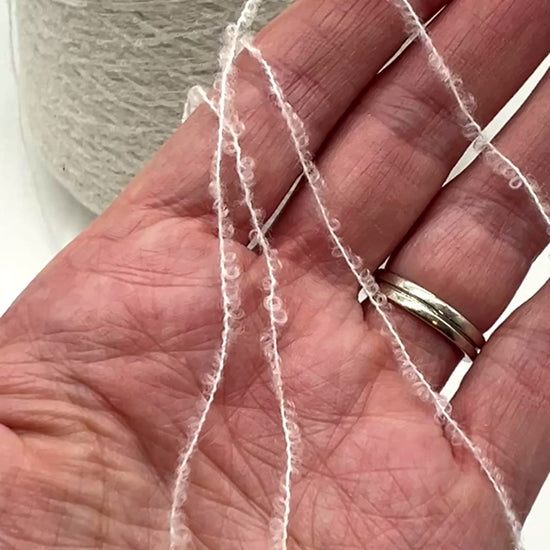 Elite iDOKNiT luxury micro-bouclé yarn, ESTRO by Zegna Baruffa Italy. 78% cashmere lace weight, Nm 9500. Authentic Italian-made soft airy loop yarn curated by iDOKNiT for professional knitting.