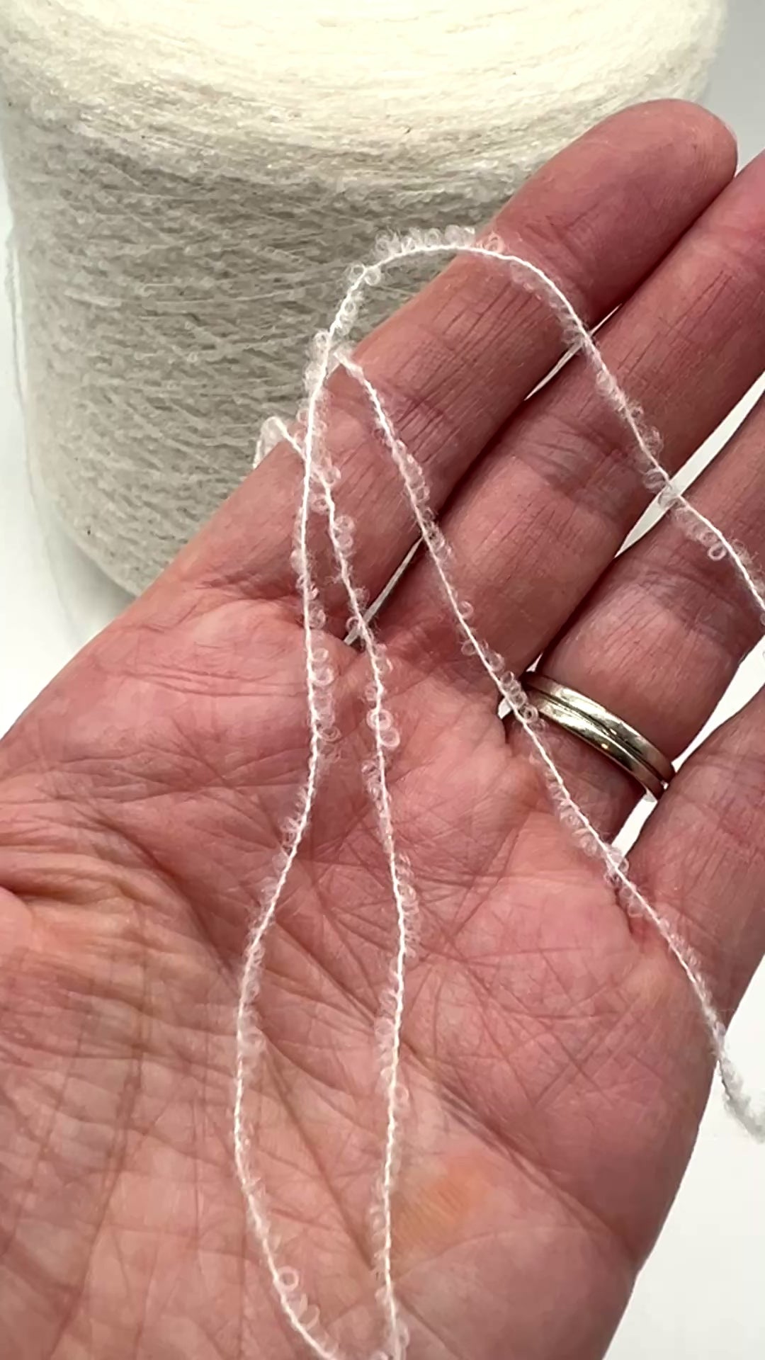 Elite iDOKNiT luxury micro-bouclé yarn, ESTRO by Zegna Baruffa Italy. 78% cashmere lace weight, Nm 9500. Authentic Italian-made soft airy loop yarn curated by iDOKNiT for professional knitting.