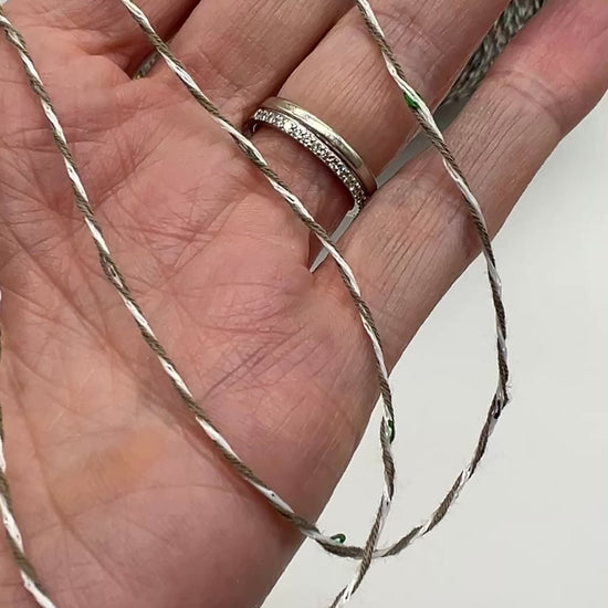 Professional grade RiGo STELLATO sport weight yarn from iDOKNiT, featuring a sophisticated 60% Italian cotton base with 2mm integrated paillettes. This authentic Italian-made yarn is curated by iDOKNiT to provide a refined shimmer and luxury finish for elegant, high-performance knitting projects.