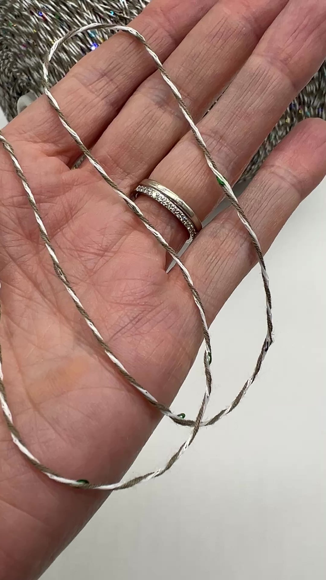 Professional grade RiGo STELLATO sport weight yarn from iDOKNiT, featuring a sophisticated 60% Italian cotton base with 2mm integrated paillettes. This authentic Italian-made yarn is curated by iDOKNiT to provide a refined shimmer and luxury finish for elegant, high-performance knitting projects.