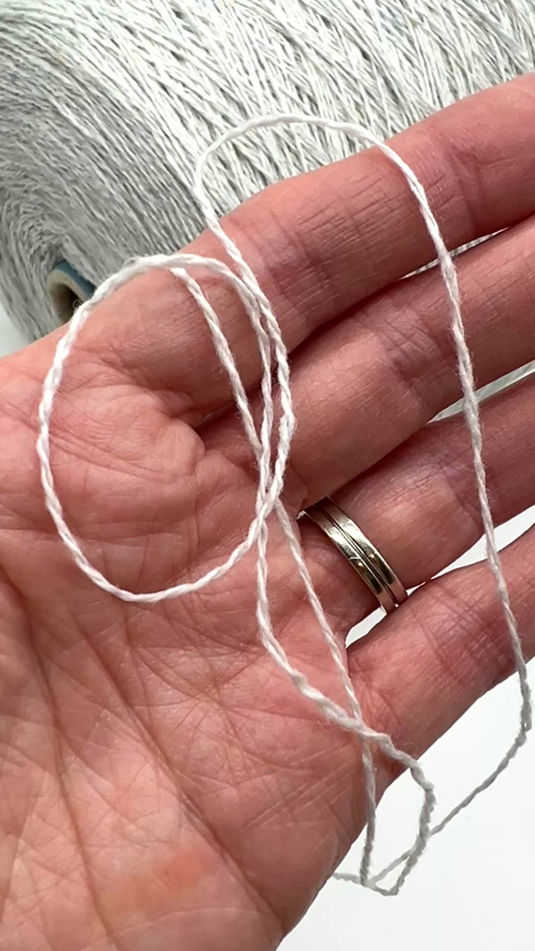 Elegant iDOKNiT SESIA SCOTLAND 100% Extrafine Merino Tweed lace yarn in Nm 2/14, showcasing a sophisticated rustic speckled texture and premium Italian wool quality.